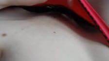 closeup of a tits and small patch of pussy hair